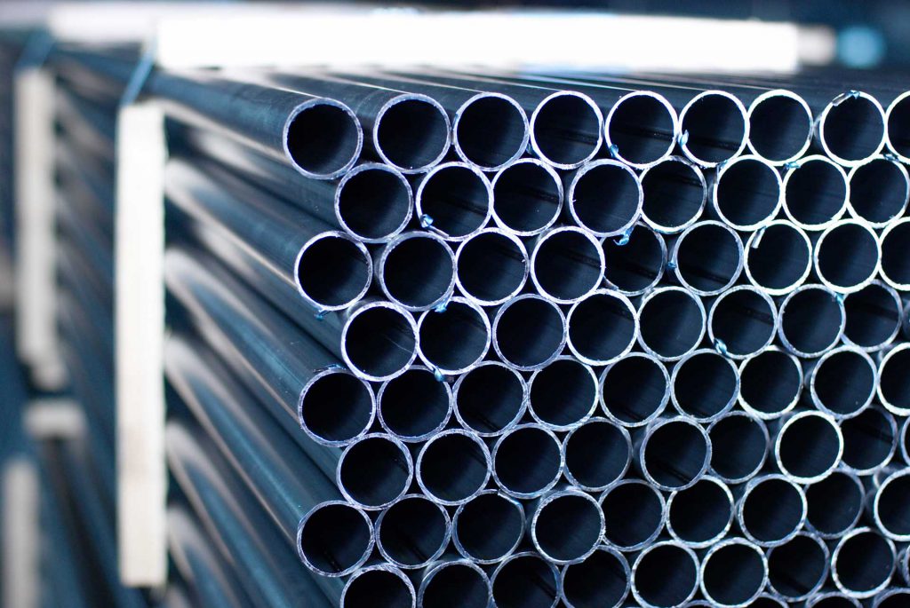 steel-pipes-bunch-on-the-rack-in-warehouse-2021-10-21-18-47-54-utc